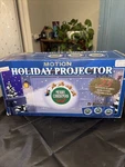 Mr Christmas Panoramic Motion Projector Year Round Outdoor Lighting System 2000. Fixed Price $74.99.